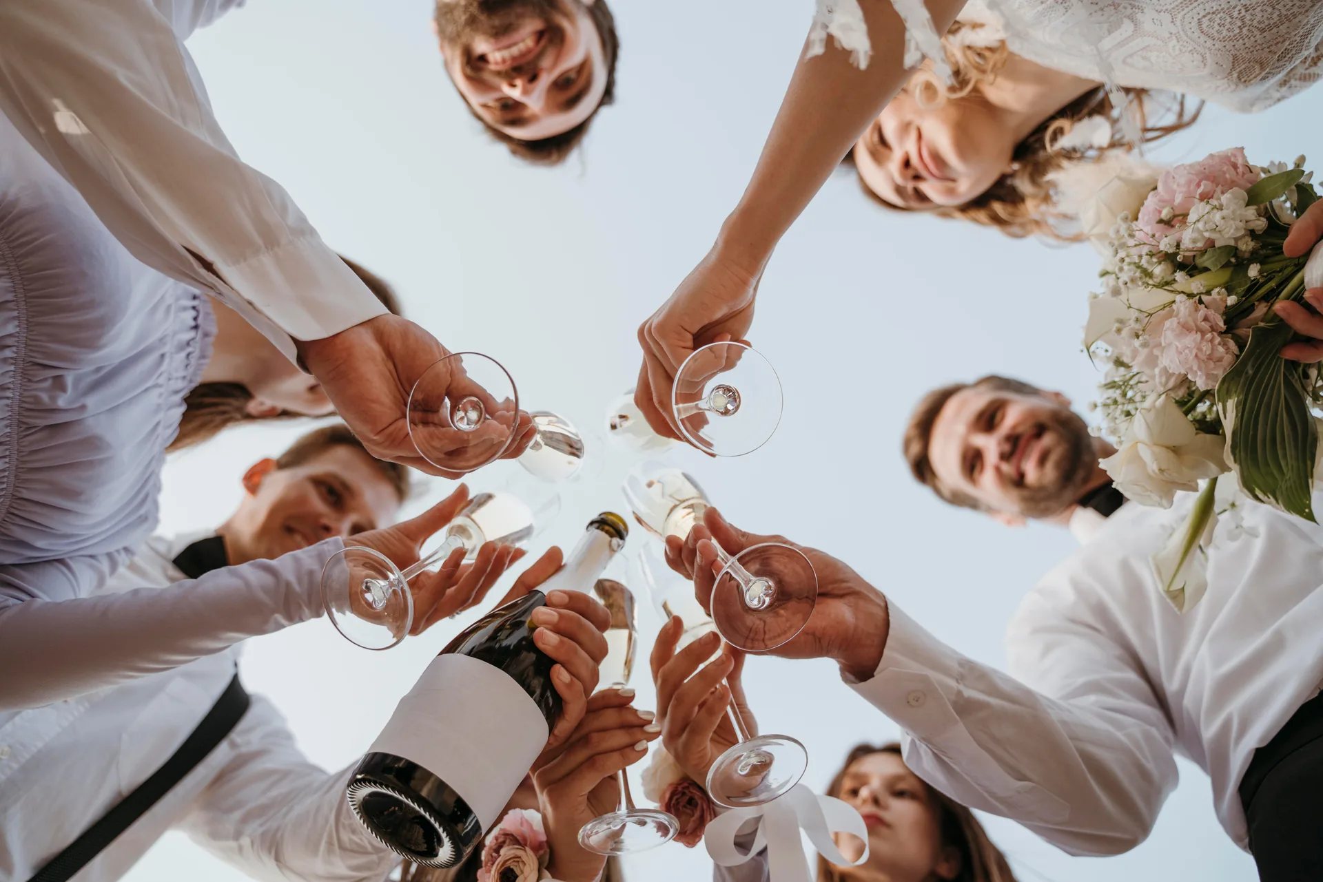 Wedding guests toasting with champagne